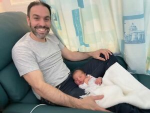 father and baby postnatal ward 